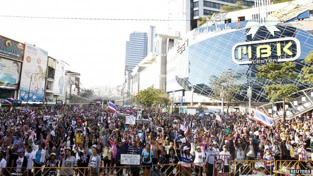 Anti-government protesters gather outside MBK shopping mall in central Bangkok on 14 January 2014