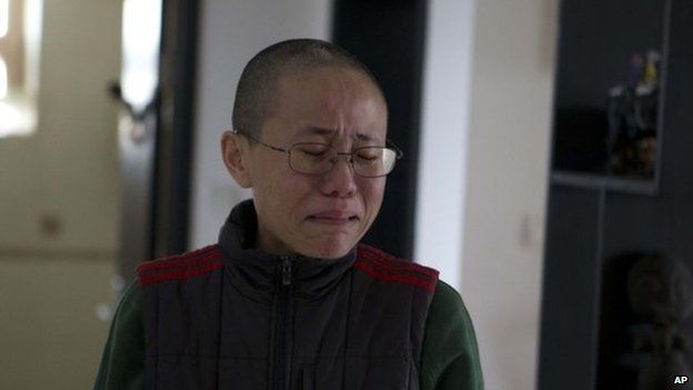 File photo of Liu Xia, wife of 2010 Nobel Peace Prize winner Liu Xiaobo, at her home in Beijing, China