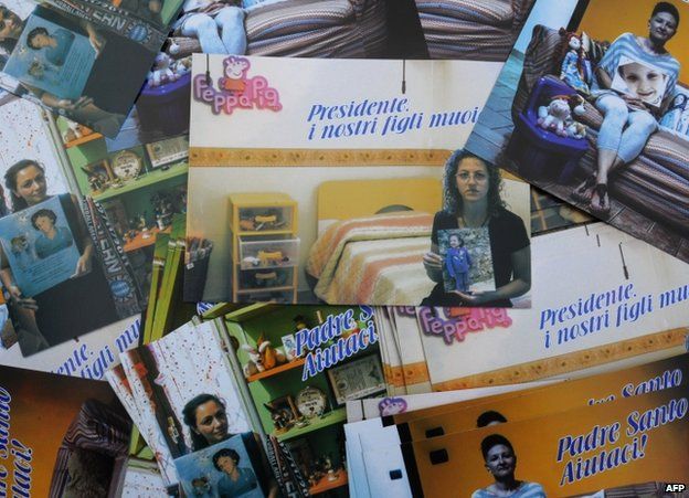 Postcards made by the Association against Illegal Dumps show mothers posing with pictures of their children who died of cancer in the Naples-Caserta area, 24 November 2013