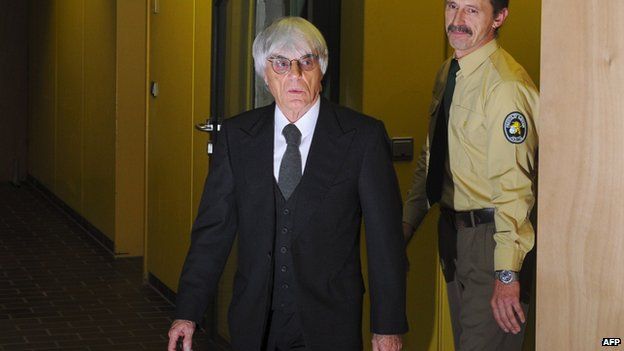 This picture taken on November 10, 2011 shows Formula One boss Bernie Ecclestone leaving the court in Munich, southern Germany