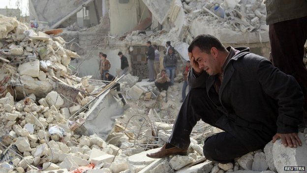 A man cries at a site hit by what activists said was a Scud missile in Aleppo's Ard al-Hamra neighbourhood, in this February 23, 2013 file photo