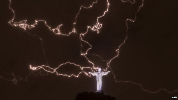 The Christ the Redeemer statue surrounded by lightning