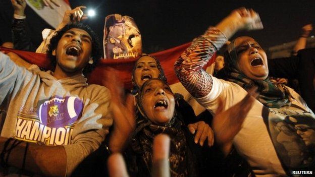 Supporters of the constitution celebrate in Tahrir Square, Cairo, 18 Jan