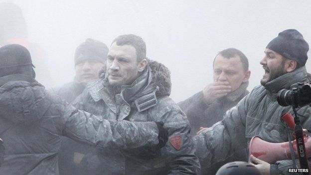 Vitaly Klitschko (centre) reacts after he was sprayed with a powder fire extinguisher during a pro-European integration rally in Kiev 19/01/2104