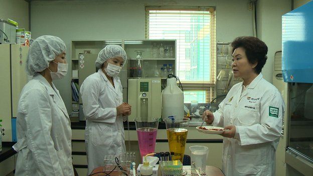 Kim Soon-ja (right) and two colleagues in her laboratory