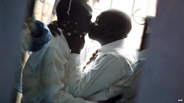 Gay men kiss in Nairobi (20 June 2006)