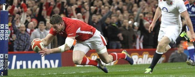 Alex Cuthbert scores one of his two tries against England in the 2013 Six Nations decider in Cardiff