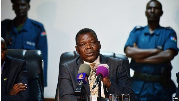 South Sudan's Minister for Justice Paulino Wanawila speaks to the media during a press conference in Juba on 28 January. He answered questions on the arrest of opposition leaders who he said had tried to stage a coup