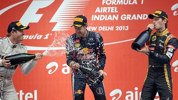 Sebastian Vettel is drenched in champagne