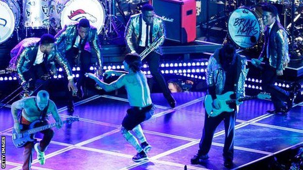 Bruno Mars (right) is joined by the Red Hot Chili Peppers in the Super Bowl half-time show