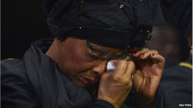 Graca Machel, the widow of former South African President Nelson Mandela, attends his funeral in his ancestral village of Qunu on 15 December 2013.