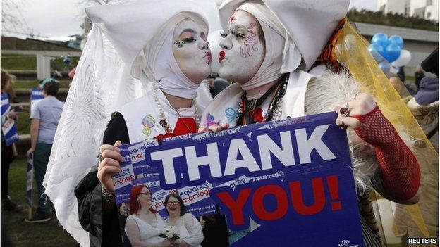 Supporters attend a symbolic same-sex marriage outside the Scottish Parliament