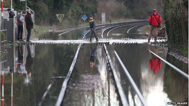 The floods at Datchet move across rail lines