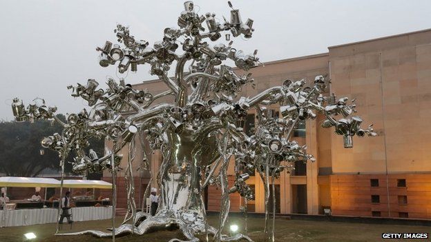 Indian artist Subodh Gupta"s sculpture "Dada" that is part of Gupta"s first major museum show in New Delhi