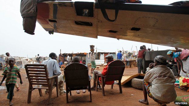 Displaced people at a camp at Bangui airport on 11 February 2014
