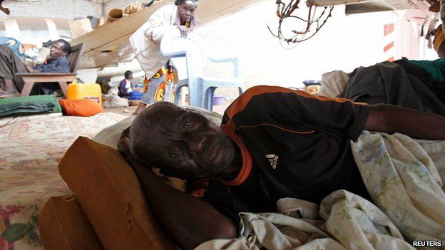 Displaced person at a camp at Bangui airport on 11 February 2014