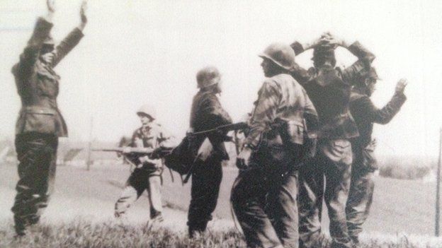 German soldiers surrendering to American GIs