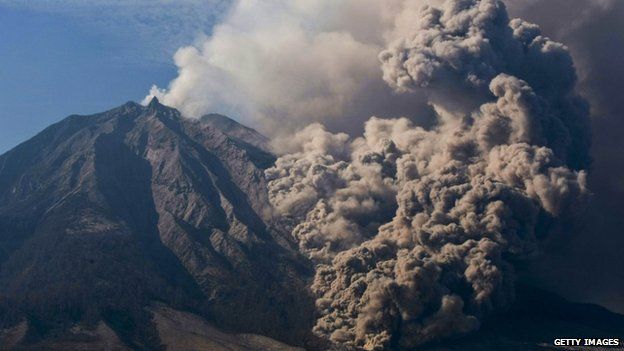 Mount Sinabung spews smoke in Karo District, North Sumatra, Indonesia, 12 February 2014