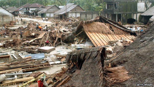 File photo: Houses lie destroyed at Sirombu village in Nias, North Sumatra, Indonesia, 29 December 2004
