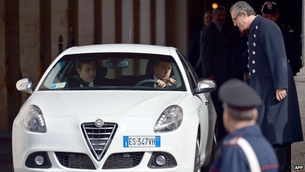 Matteo Renzi leaves presidential palace (17 Feb)