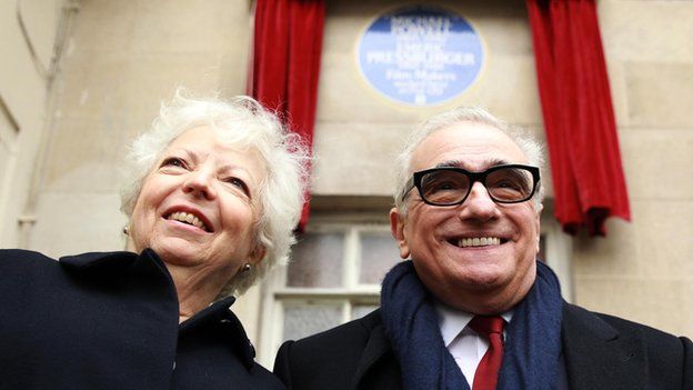 Thelma Schoonmaker and Martin Scorsese beneath Powell and Pressburger plaque