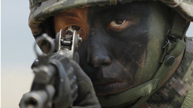 File photo: A South Korean marine takes position during the joint military exercises in 2013 as a part of annual Foal Eagle military exercises in South Korea