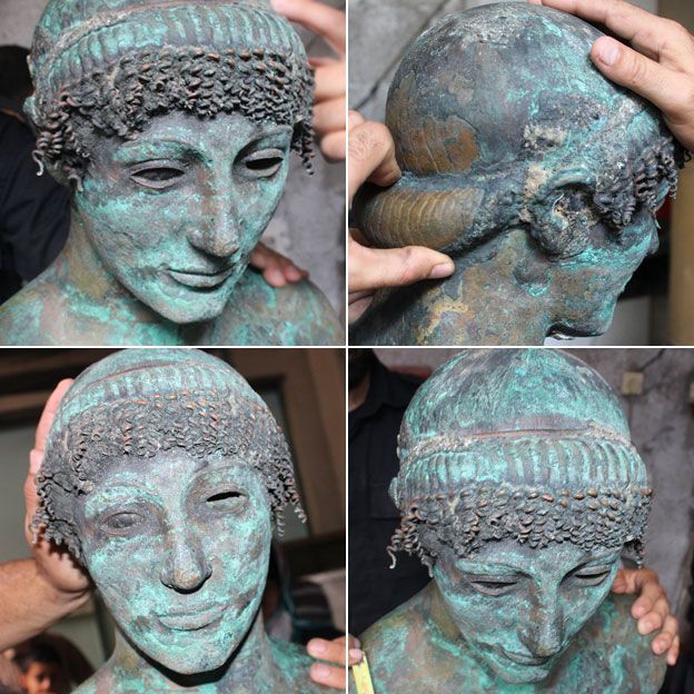Снимки головы статуи