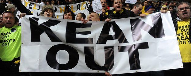Blackburn Rovers fans hold up a 'Kean out' banner during Steve Kean's time in charge of the club