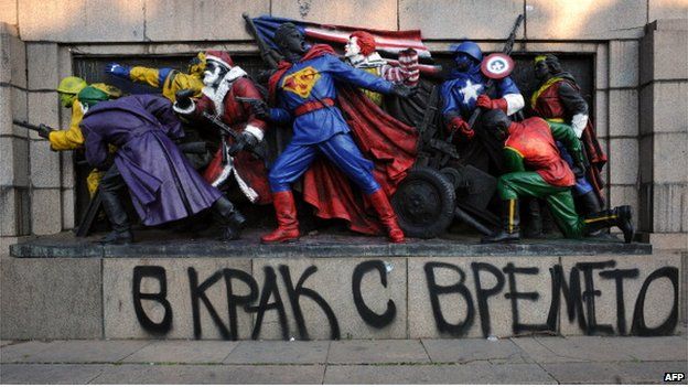 Action heroes, Santa and Ronald McDonald adorn a Soviet monument in Sofia (17 June 2011)