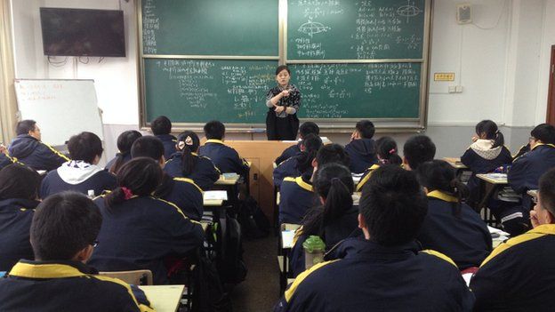 Chinese 15-year-olds study maths at a school in Shanghai