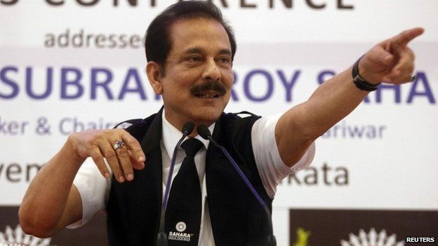 Sahara Group Chairman Subrata Roy gestures as he speaks during a news conference in Calcutta on November 29, 2013