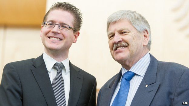 Udo Voigt, member of the German far-right party NPD (R) and Peter Richter, the party's lawyer