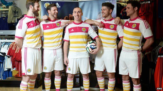 Scotland players model new away kit