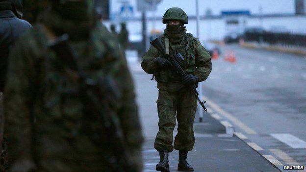 Armed men outside Simferopol, Crimea, on 28 February 2014