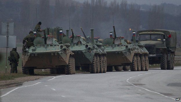 Russian armoured personnel carriers and a truck are near the town of Bakhchisarai, Crimea. 28 Feb 2014