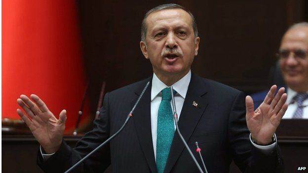 A file photo taken on 14 January showing Turkey's Prime Minister Recep Tayyip Erdogan delivering a speech to the members of the Turkish Parliament in Ankara