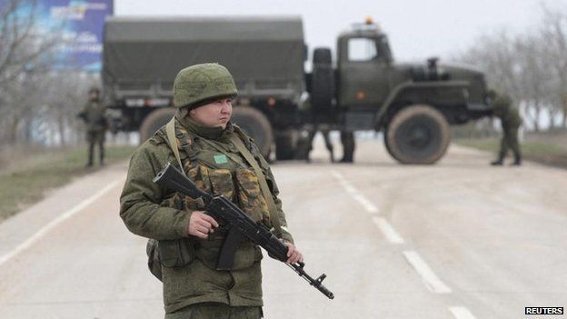 Armed servicemen in Crimea