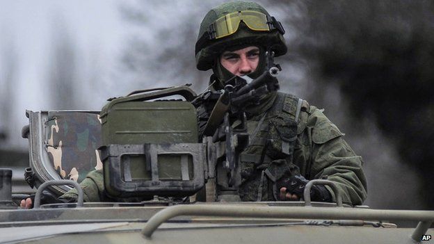 Uniformed man in military vehicle in Balaklava, Crimea, on 1 March 2014