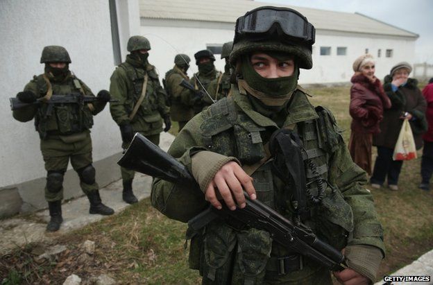 Russian soldiers outside a Ukrainian base in Perevalnoye, Crimea, 2 March