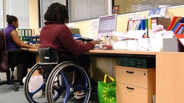 Disabled man in office