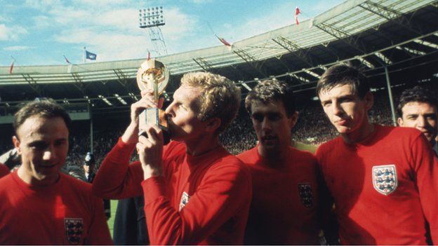 Bobby Moore kisses the Jules Rimet trophy after England beat West Germany to win the 1966 World Cup