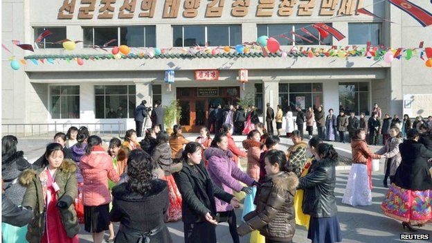 People dance to celebrate as the nation holds elections for deputies to the 13th Supreme People's Assembly