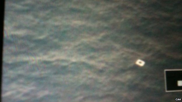 Image released by Vietnam's civil aviation authority appears to show object in sea that officials say could be a fragment of the missing Malaysia Airlines flight