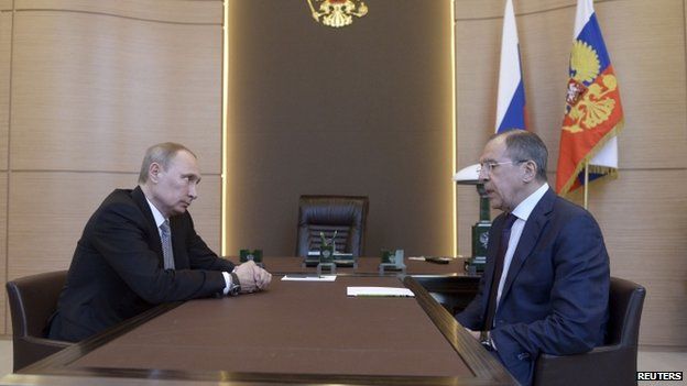 Russian President Vladimir Putin (left) meets Foreign Minister Sergei Lavrov in Sochi on 10 March 2014