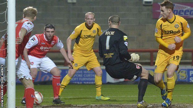 Tom Naylor scores the opening goal for Newport against Morecambe