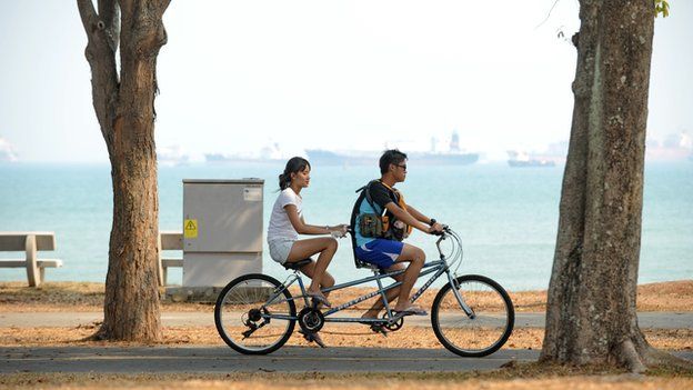 People on bikes in Singapore