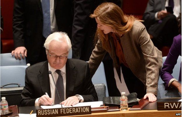 Samantha Power talks with her Russian counterpart Vitaly Churkin at United Nations headquarters in New York on March 15