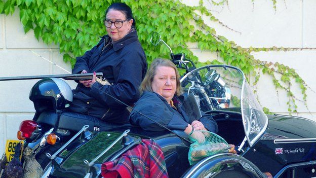 Jennifer Paterson and Clarissa Dickson-Wright on their motorbikes in series one of 'Two Fat Ladies'