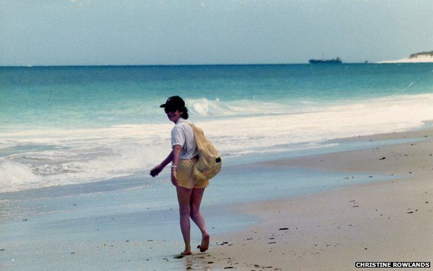 Christine Rowland's mother, Lorraine, walking on a beach