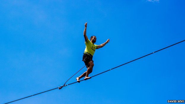 A man on a tightrope